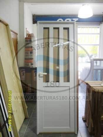 Puerta aluminio 36 con vidrio espejado con buzn.