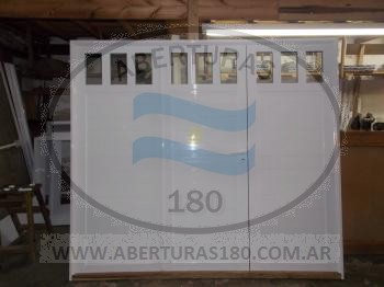 Puerta modelo A con pao fijo lateral vidrio 3+3 manijon 0.50 cm.