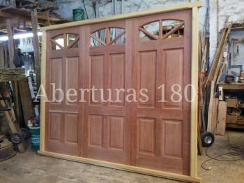 Puerta en saligna 0.90 x 2.00, tablero machimbre, 6 vidrios repartidos 1/4 punto c/ cerradura electrnica.