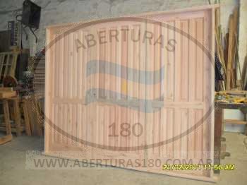 Puerta lamo 3 tableros 3 vidrios.