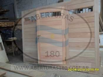 Puerta cedro marco madera dura 9 tablero recto 0.80 x 2.00.