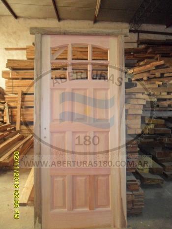 Puerta lamo 3 tableros 3 vidrios.