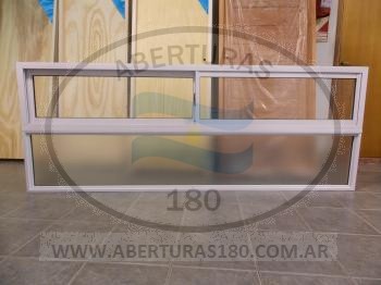Puerta corrediza bajo parrilla. 